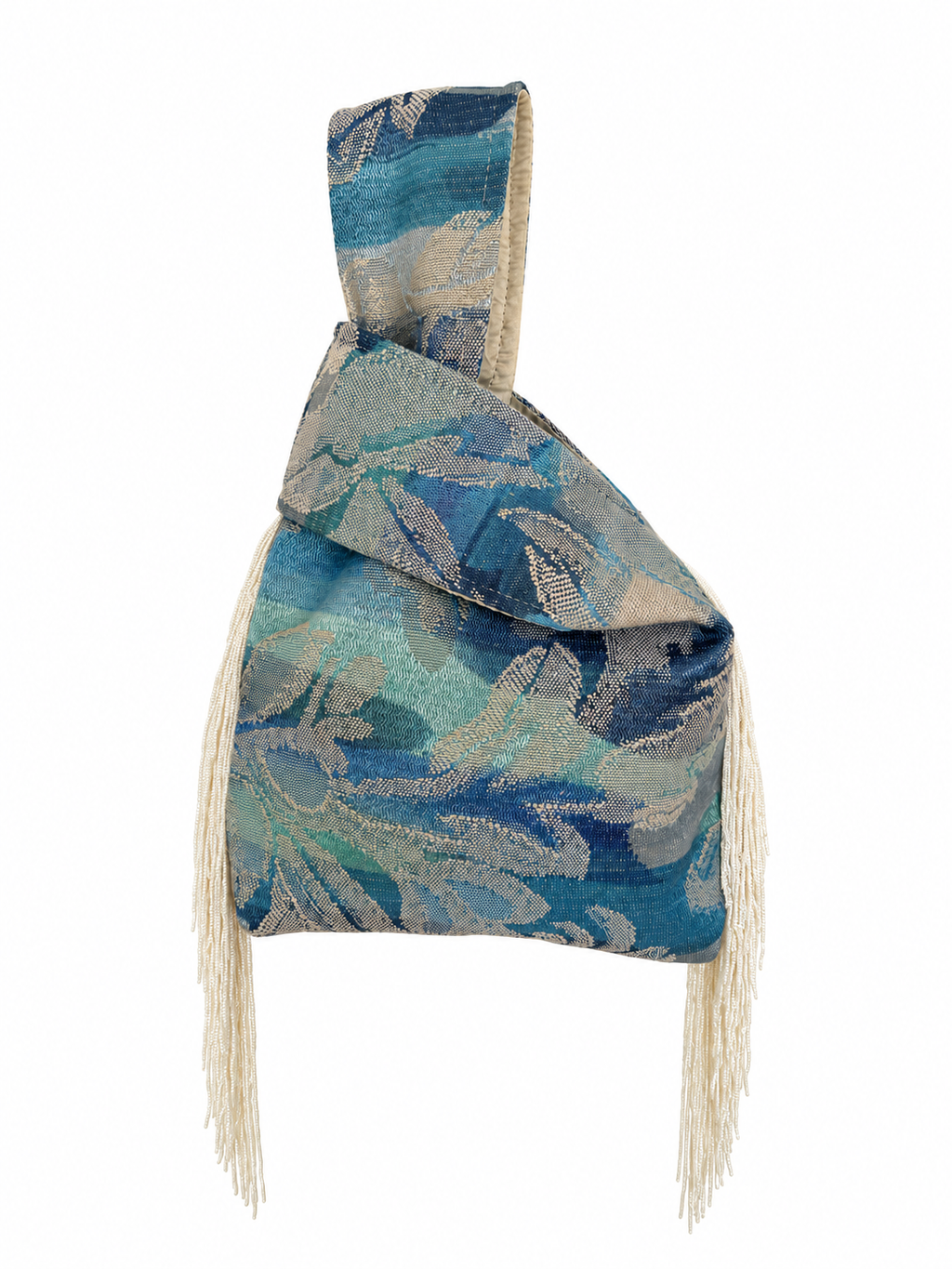 The Daydreamer blue floral Japanese knot bag with closed handles and cream side fringe
