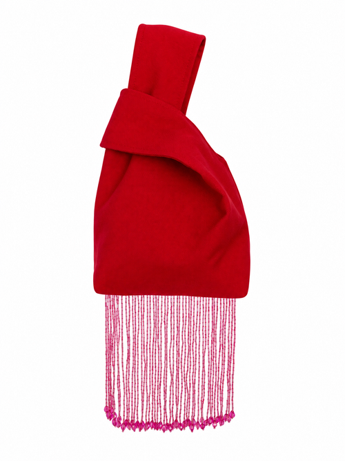The Flirt red Japanese knot bag with closed handles and pink beaded bottom fringe